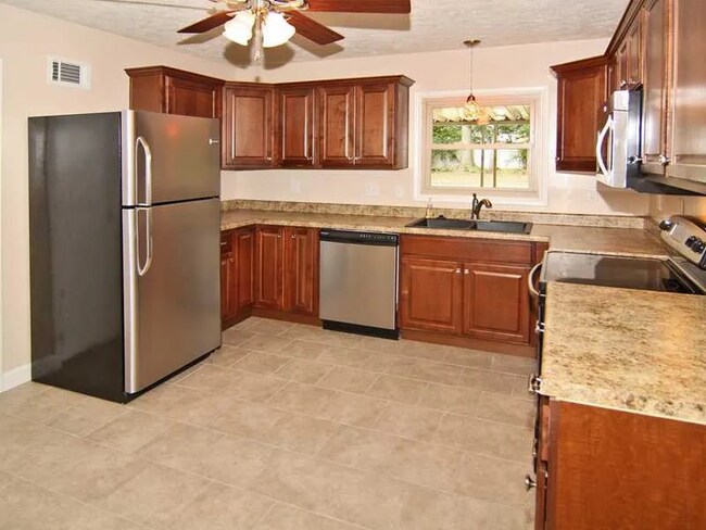 Foto del edificio - 10118 Holaday Dr W