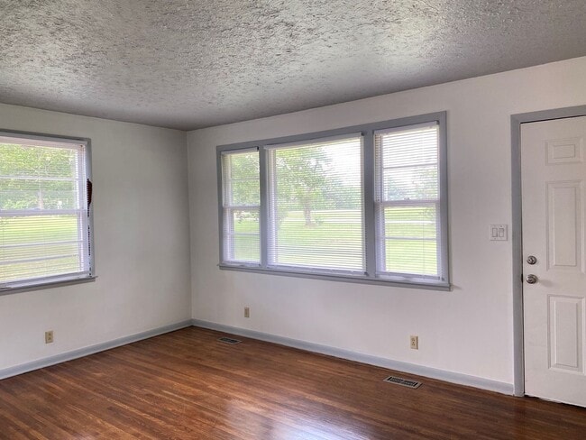 Building Photo - 3 Acres in Sango! All Brick House with Unf...