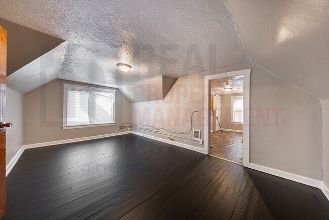 Building Photo - 11702-11704 Saywell Ave,