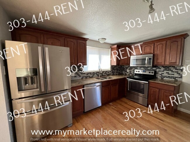 Building Photo - 5 Bedrooms & 2 Bathrooms walking distance to the Sheridan Light Rail Station!