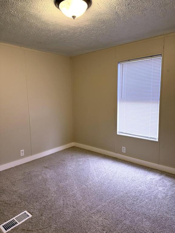 Building Photo - 7017 Big Daddy Dr