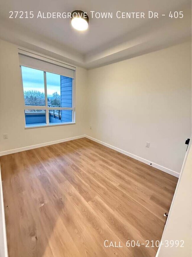 Photo du bâtiment - Brand New Condo Near Fraser Highway