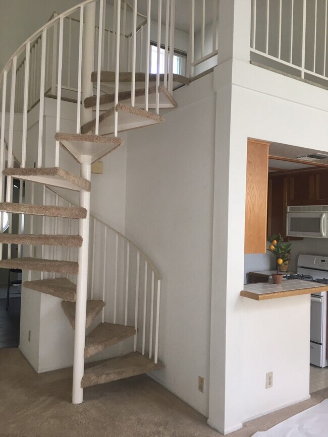 spiral staircase to loft - 8505 Gulana Ave
