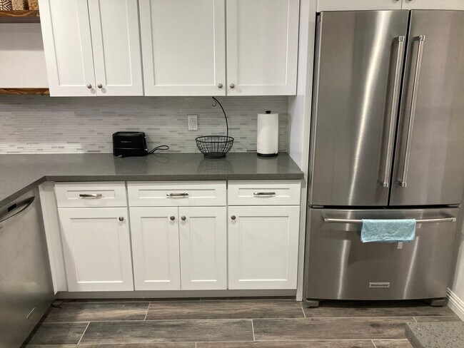 Building Photo - Beachside Furnished Retreat! Remodeled 2BD/2BA Condo Steps from the Sand!