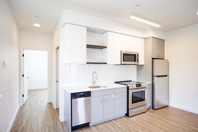 Building Photo - Spacious 1-Bedroom w/Condo-Grade Finishes + Balcony!