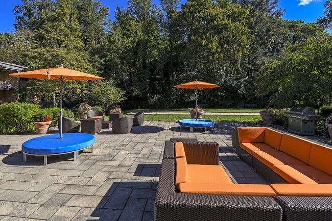 Outdoor Lounge - Falls Village Apartments