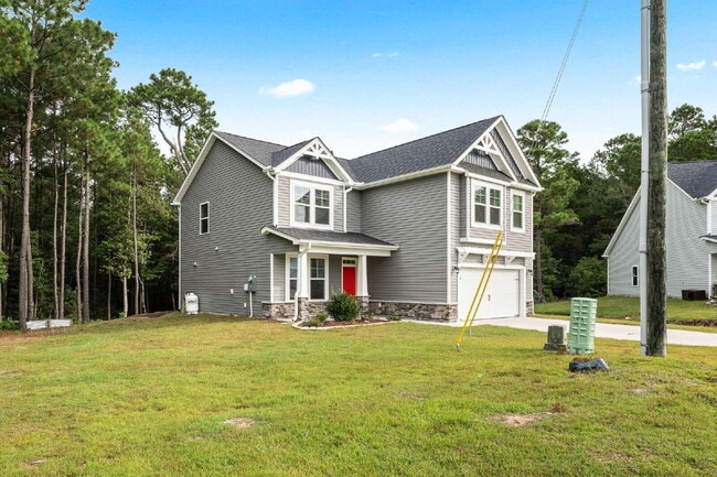 Building Photo - Spacious 4-Bedroom Retreat with 2.5 Baths ...