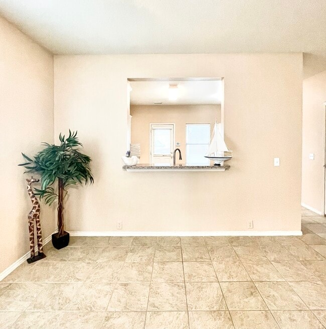 Here is another view of the living room and kitchen connection. - 29723 Sullivan Oaks Dr