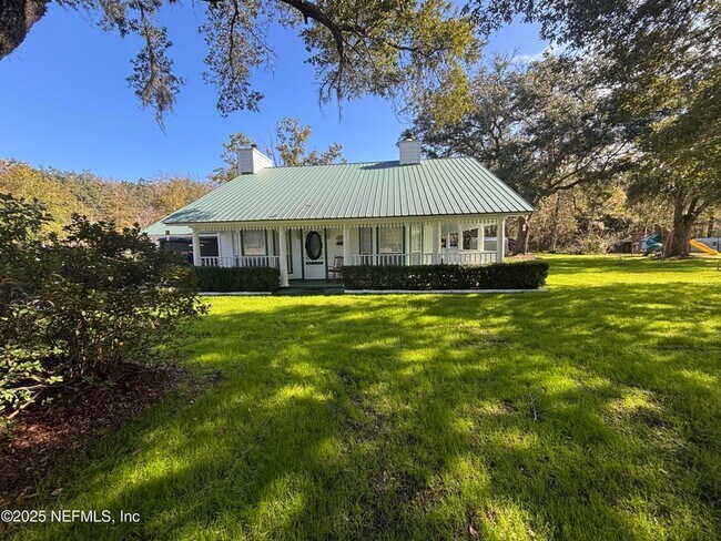 Foto del edificio - 15813 Butch Baine Dr