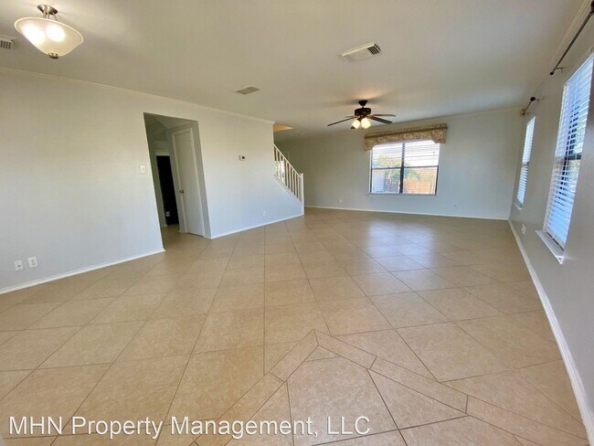 Building Photo - 3 br, 2.5 bath House - 6911 Teton Ridge