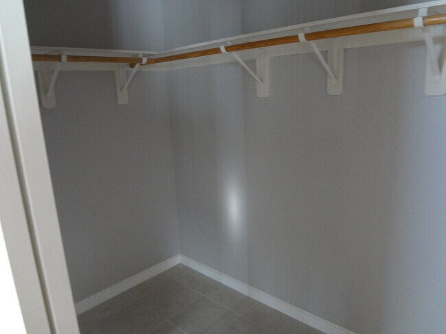Building Photo - THIS 1,596 SQ. FT. HOME HAS 3 BEDROOMS, 2.5 BATHROOMS, A 2 CAR GARAGE LOCATED ON A CORNER LOT AND...
