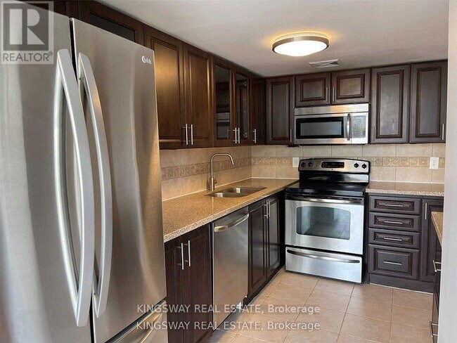 Photo du bâtiment - 509-350 WEBB Dr