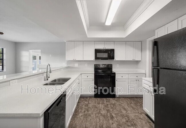 Building Photo - 8217 Fishhawk Ave