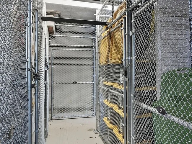 Building Photo - Bright Top-Floor 2BR/2BA Condo | 1,075 SF | 2 Secure Garage Parking Spaces | Available Now