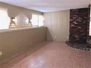 Spacious lower level Family room with access to additional storage area and laundry. - 14 Baron Rd