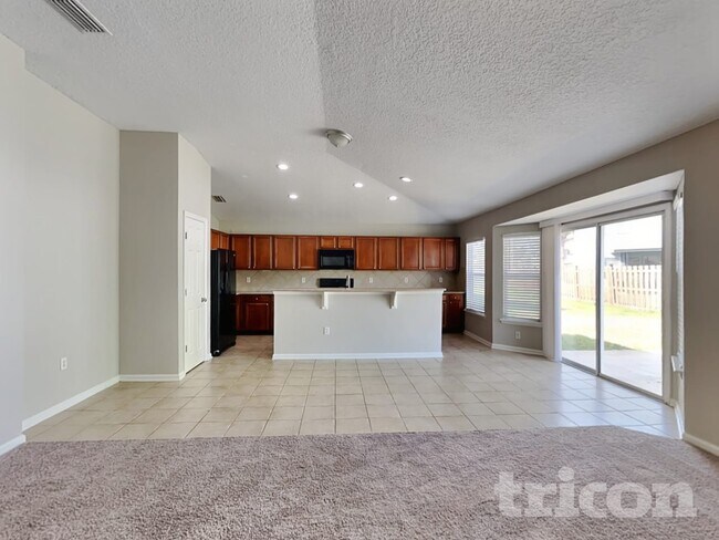 Building Photo - 11238 Justin Oaks Dr N