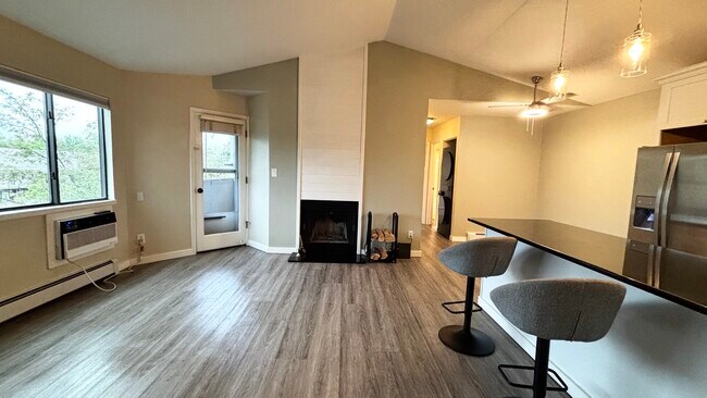 Spacious living area and a wood-burning fire place - 3515 28th St