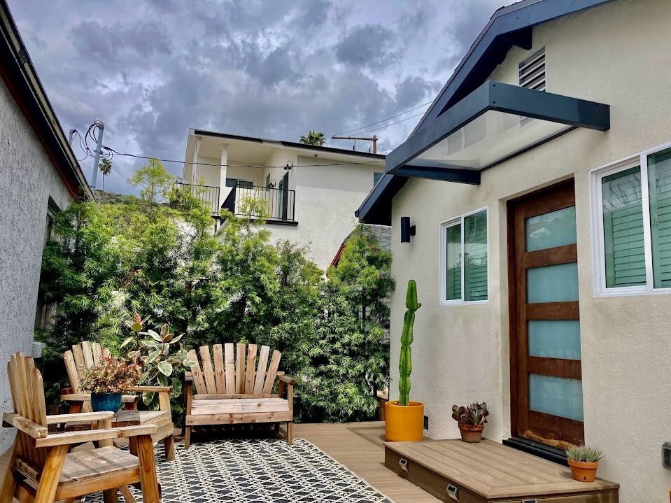 Front deck by Trex Decking. Private, spacious, with a full size natural fence with Podocarpus hedges - 5172 Caspar Ave