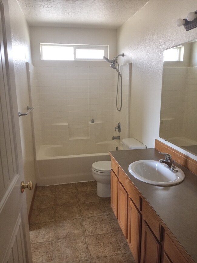 Upstairs bathroom with full bath - 6300 W Trestle St