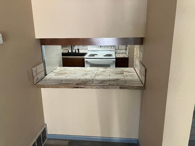 Pass through to kitchen, breakfast nook - 12162 Huron St Apartment