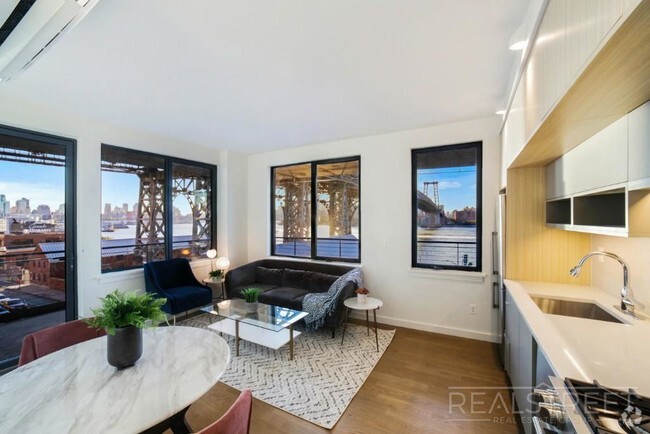 Building Photo - Waterfront Luxury 2 BED with Wrap arround ...