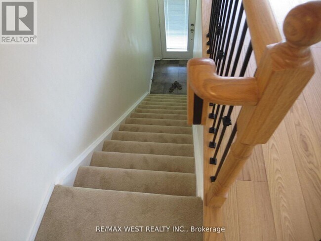 Building Photo - 5615 Oscar Peterson Blvd