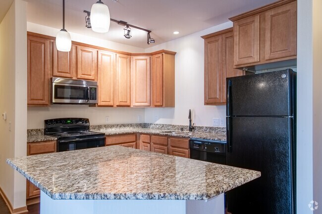 1BR + Den, 1BA - 1000SF - The Addison