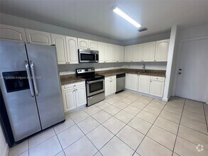 Building Photo - 7375 NW 173rd Dr