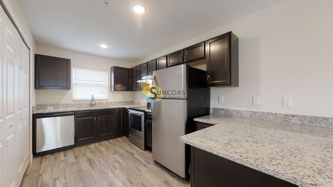 Building Photo - 9454 N Travis Dr