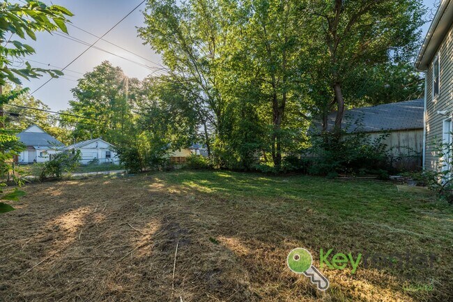 Building Photo - 1st Month FREE! Spacious 4 bedroom 1 bath ...