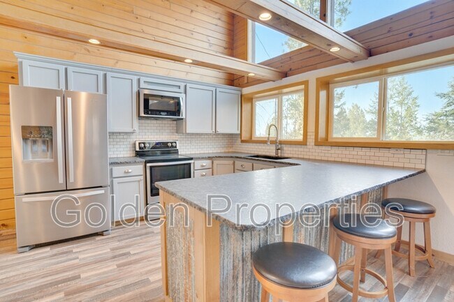 Foto del edificio - 11590 W Riverview Dr