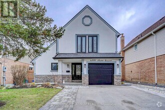 Building Photo - 4226 Treetop Crescent