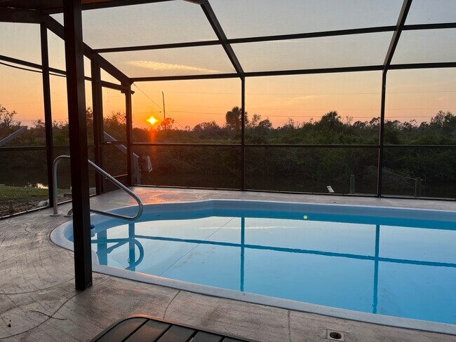 Lovely sunsets over pool, canal and preserve - 3193 Desoto Dr