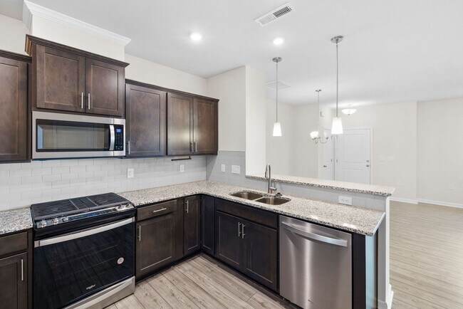 Foto del edificio - Luxury 3BR Townhome Near Costco & 540 – Built in 2023!