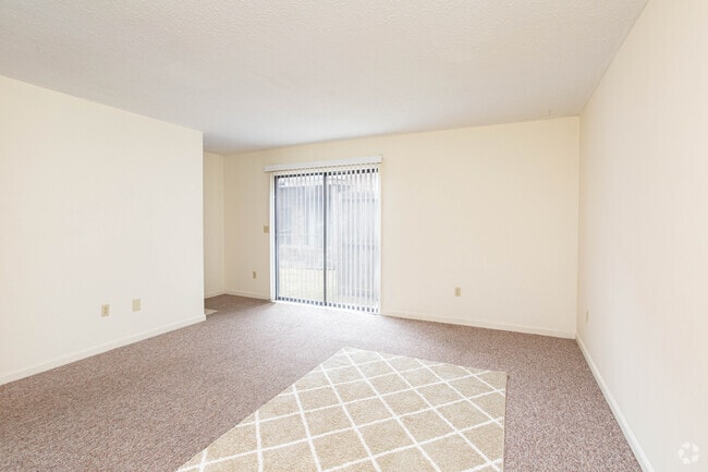 2BR, 1.5 BA - 1,050 SF - Living Room - Woodside Townhomes