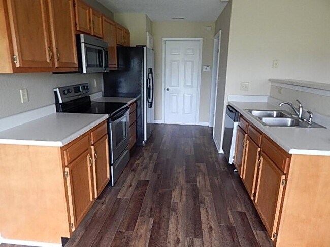 Foto del edificio - 7644 Scatter Woods Ln