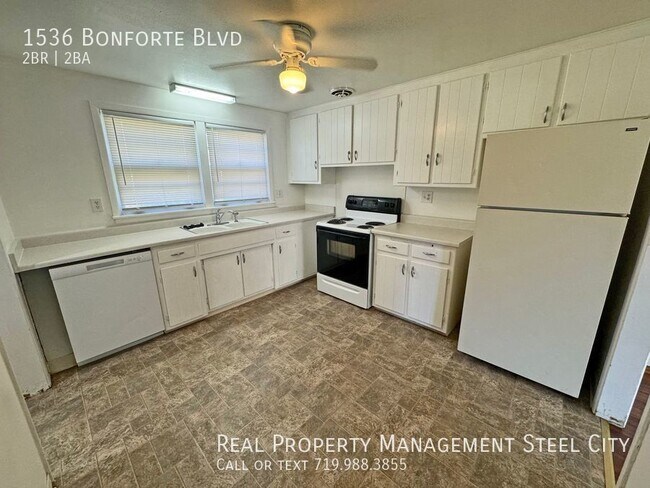 Building Photo - Charming 2-Bedroom Condo in Prime Pueblo L...