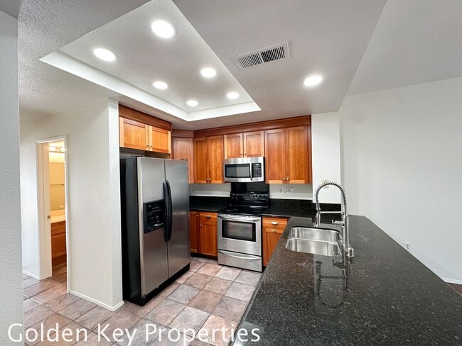 Building Photo - Four-bedroom townhome in The Trails at Cal...