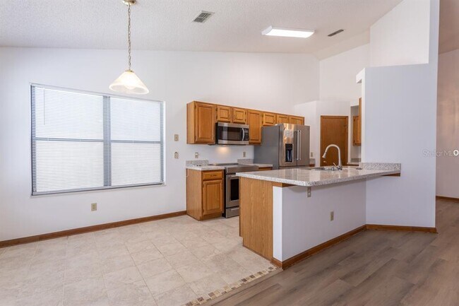 Foto del edificio - 14180 Hampton Falls Dr N