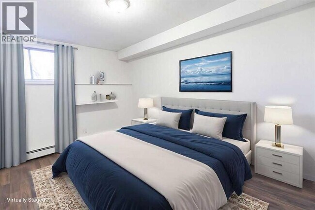 Photo du bâtiment - 216 Doverglen Crescent SE