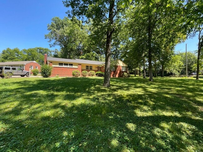 Photo - Beautiful Home located on .53 Wooded Corner Lot.