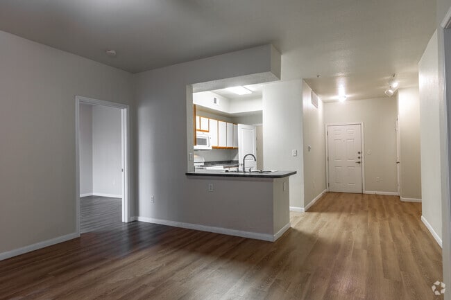 2BR, 2BA - 1,088SF - Living Room - Mariposa Jason Avenue 55+ Apartment Homes