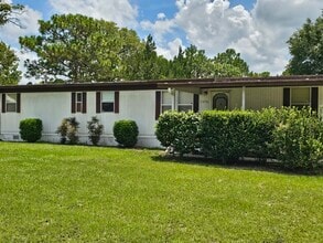 Building Photo - 7096 W Jackson Ln