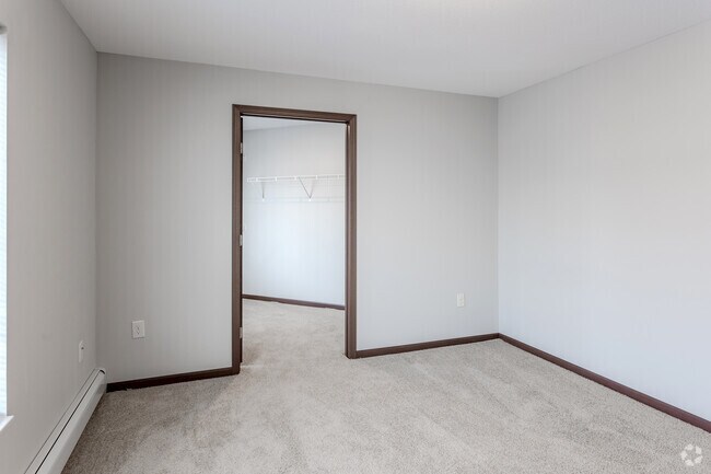 2BR, 1BA - 1,076SF - Primary Bedroom - Cardinal Pines 222