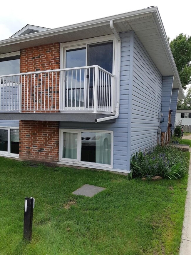 Building Photo - 6312-6358 58 Ave