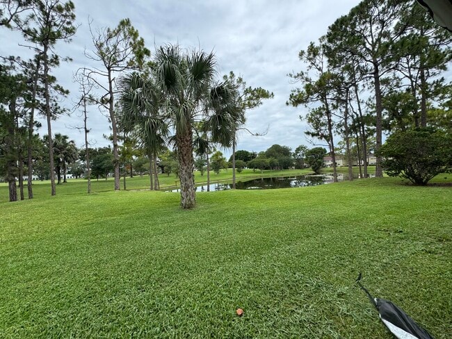 Building Photo - 1803 Palm Beach Trace Dr