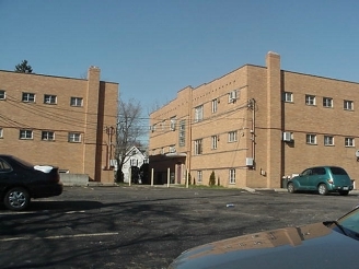 Building Photo - Celestial Arms Apartments