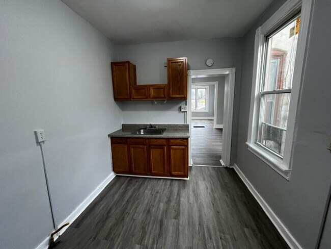 Building Photo - 2 bedroom 1 bath with walk up attic