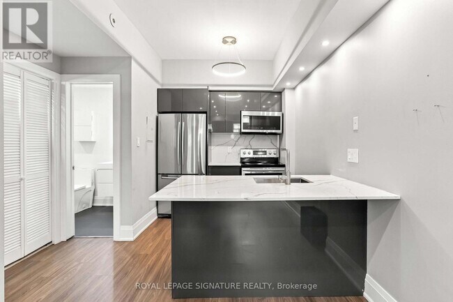 Photo du bâtiment - 605 Shoreline Dr