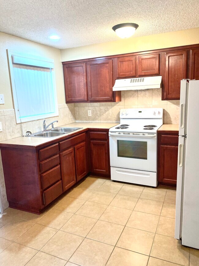 Foto del edificio - 6866 E Maplewood Ave